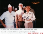 Ex-CBI Roundup editor Dwight King, with a Bartles and James poster "doctored" to tout Ex-CBI Roundup subscriptions at the CBIVA National Reunion in Denver, July 1988.