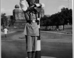 A Calcutta traffic policeman directs traffic from his raised stand from under a canopy.   Photo from Samuel J. Louff.