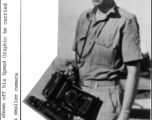 Bob Lichty shows off his Speed Graphic camera which he carried in the CBI before switching to a smaller camera.