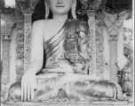 Smiling Buddha near Bhamo, Burma, during WWII.