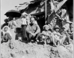 The Burma Surgeon, Gordon Seagrave, returns to his hospital in the jungles of Burma, welcomed by both local children and a GI (on far right). During WWII.