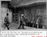 Mess line at Camp Kanchrapara, India. Here are personnel of the 164th Signal Photographic Company.  Photo by Syd Greenberg.