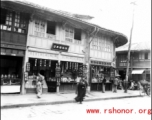 A tidy sweets shop on a street in southern China, probably Yunnan province, during WWII.