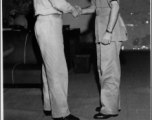 General Stratemeyer shakes hands with General Judecke (?) in the CBI on April 3, 1945. HQ AAF IBTPL.