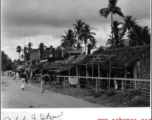 A roadside village in Burma or India during WWII.