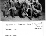 GI group kneels in New Delhi, alongside US barracks, close to Connaught Circus, Christmas, 1942.  Letter from William Fisher in 1984, formerly Sgt. R.A.F., Air H. Q. New Delhi, looking for American war acquaintances such as “Mac” McGuigin, Bob Gifford, and Pete Spellman  Photo and letter from William Fisher.