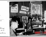 GIs drink in a well-stocked "Club 11" in Kunming, China, in 1945, during WWII.  Photo from Emory J. Wilcox (w/Merrill's Marauders).