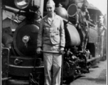 A GI rides a narrow-gauge train engine. In the CBI during WWII.  Photo from Walter De Blair.