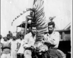 GIs show off tiger hunted in India during WWII.