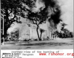 View of a building burning in Rangoon, Burma. In the CBI during WWII.
