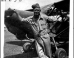M/Sgt. Ed Smith leans on the prop of a L-5-B at home base at Kalikunda, India, shortly after arrival in December, 1944.  In the CBI during WWII.