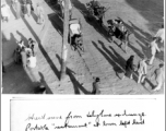 Street scene from angle of telephone exchange in Kunming, China, March 1945.