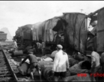 Allied gas train at the edge of the field, Liuzhou (Luichow), China Sept 1944, after a Japanese bombing raid, during WWII.