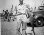 GI holding shark in Karachi, India 1942.  From the collection of Frank Bates.