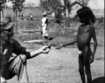 American soldier with child. Probably India 1942 or 1943.