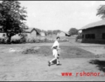 Nick Arico coming from shower, Chaukulia, India 1943.