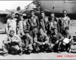 Ringer Squadron personnel: Lecher, Schmidt, Clark, Penny, Routon; rear; Bryan, Gornick, Gebhart, Williams, Vollmer, Arndt at Yangkai, Early 1945, with a B-25 in the background.  From the collection of Frank Bates.