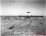 An American B-25 bomber flies at minimum altitude, probably during training / practice of 'low-level attack techniques', for 'skip bombing'.   B-25 pilots of the Tenth Air Force (341st Bomb Group) and Chinese-American Composite Wing (1st Bomb Group) were trained in 'skip bombing' in India during 1943 and 1944.