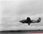 B-25 Mitchell bombers take off from an airstrip, possibly Yangkai (Yangjie) air strip in Yunnan province, China.