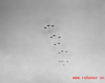 B-25 Mitchell bombers above in flight in the CBI, in the area of southern China, Indochina, or Burma.