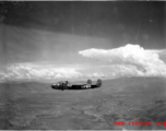 B-25 Mitchell bombers in flight in the CBI, in the area of southern China, Indochina, or Burma. During WWII.