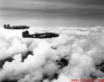 B-25 Mitchell bombers in flight in the CBI, in the area of southern China, Indochina, or Burma.