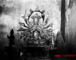 Buddhist statue in a temple in Yunnan, China, during WWII.