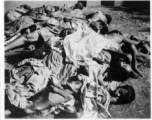 Unfortunate souls, victims of famine, disease, or some other cause. In India.  Scenes in India witnessed by American GIs during WWII. For many Americans of that era, with their limited experience traveling, the everyday sights and sounds overseas were new, intriguing, and photo worthy.