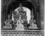 Small ornate altar.  Scenes in India witnessed by American GIs during WWII. For many Americans of that era, with their limited experience traveling, the everyday sights and sounds overseas were new, intriguing, and photo worthy.