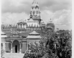 An elaborate temple.  Scenes in India witnessed by American GIs during WWII. For many Americans of that era, with their limited experience traveling, the everyday sights and sounds overseas were new, intriguing, and photo worthy.